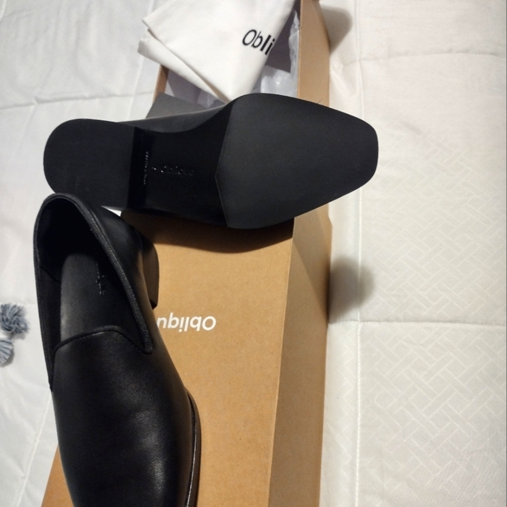 Oblique loafers size 7, runs one size small.